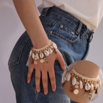Bohemian Braided Rope Bracelet with Shell Beads and Tassel Detail