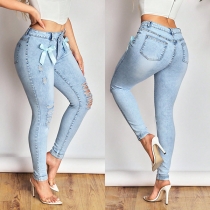Fashion Irregular Waist Bowknot Distressed Skinny Jeans