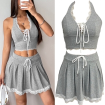 Fashion Lace Spliced Two-piece Set Consist of Halterneck Crop Top and Pleated Mini Skirt
